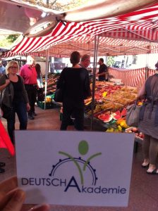 A fruit and vegetable stand at Wochenmarkt am Wittenbergplatz.